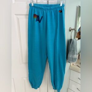 Aviator Nation Turquoise Sweatpants with Rainbow 'AN' Logo